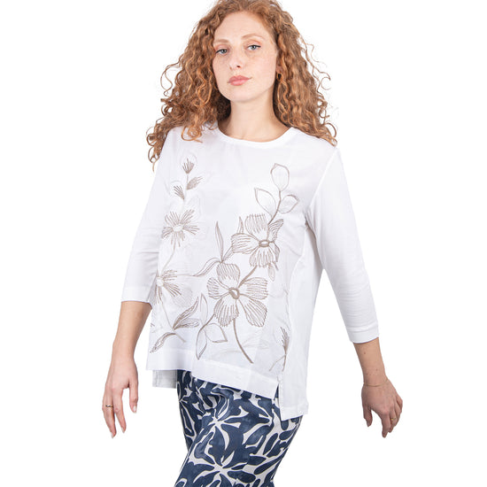 Maglia con fiori beige.