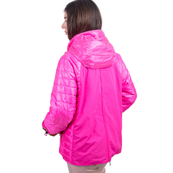 Giacca reversibile realizzata con imbottitura in micro piuma.