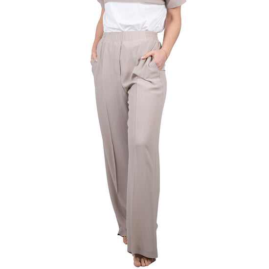 Pantalone beige gamba morbida.