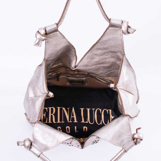 Monospalla in pelle laminato oro