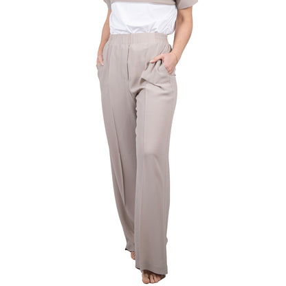 Pantalone beige gamba morbida.