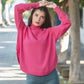 Maglia in lana collo alto fucsia